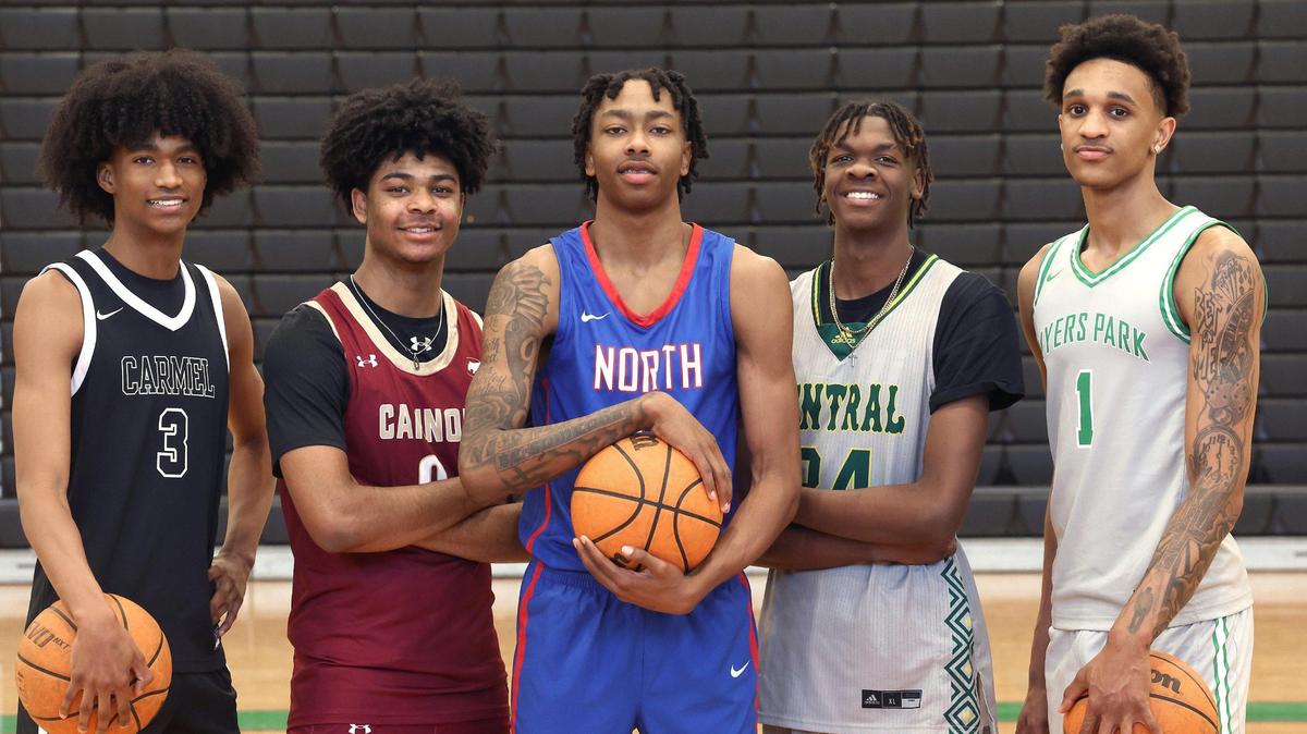 (L-R) All Observer boys basketball team members Kam Taylor of Carmel Christian, Austin Swartz of Cannon, Isaiah Evans of North Meck, Desmond Kent Jr., of Central Cabarrus and Sadiq White of Myers Park on Tuesday, March 19, 2024.