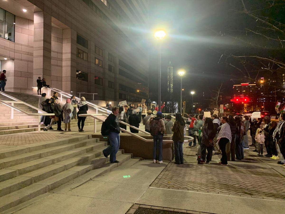 Pro-Palestine protesters call for the Charlotte City Council to pass a resolution in support of a ceasefire in the Israel-Hamas war after the council’s Monday meeting. The group would go on to briefly block E. Fourth Street in uptown.