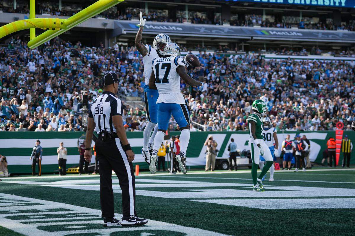 Carolina Panthers wide receiver Tetairoa McMillan (4) celebrates after Carolina Panthers wide receiver Xavier Legette (17) scores a touchdown during a game against the New York Jets at MetLife Stadium, Oct 19, 2025, East Rutherford, NJ, USA.