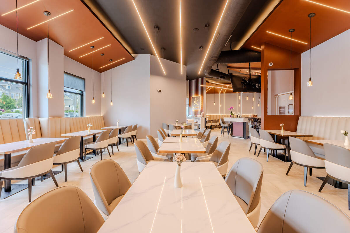 Clean modern decor shapes the vibe at Flame Bistro & Bar.