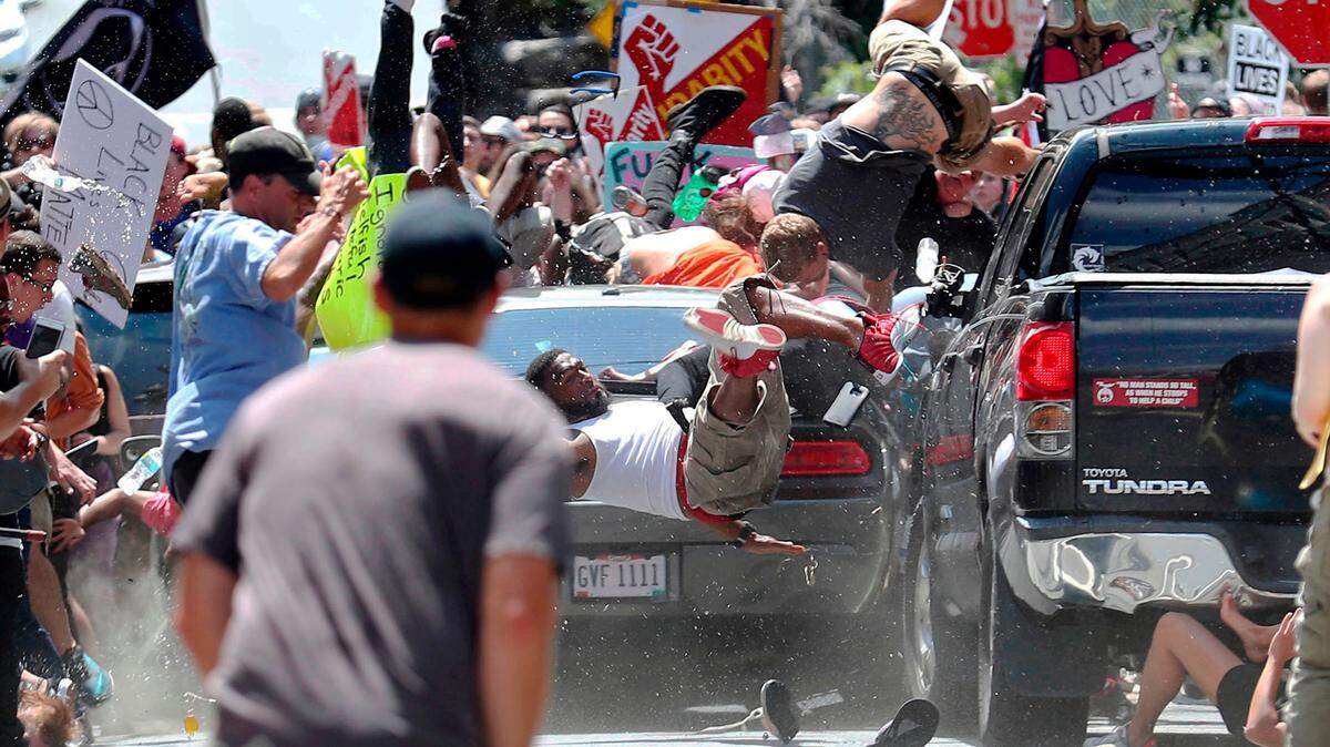 Ryan Kelly, then a photographer with the Daily Progress in Charlottesville, Va., won the Pulitzer Prize for breaking news photography for this photo from a protest of a white nationalist rally in August.