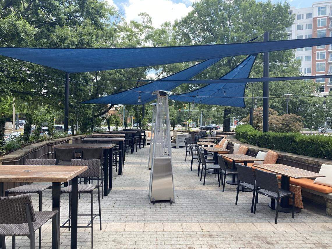 Bulla Gastrobar has a long patio decked out with chairs and umbrellas to provide shade while dining.