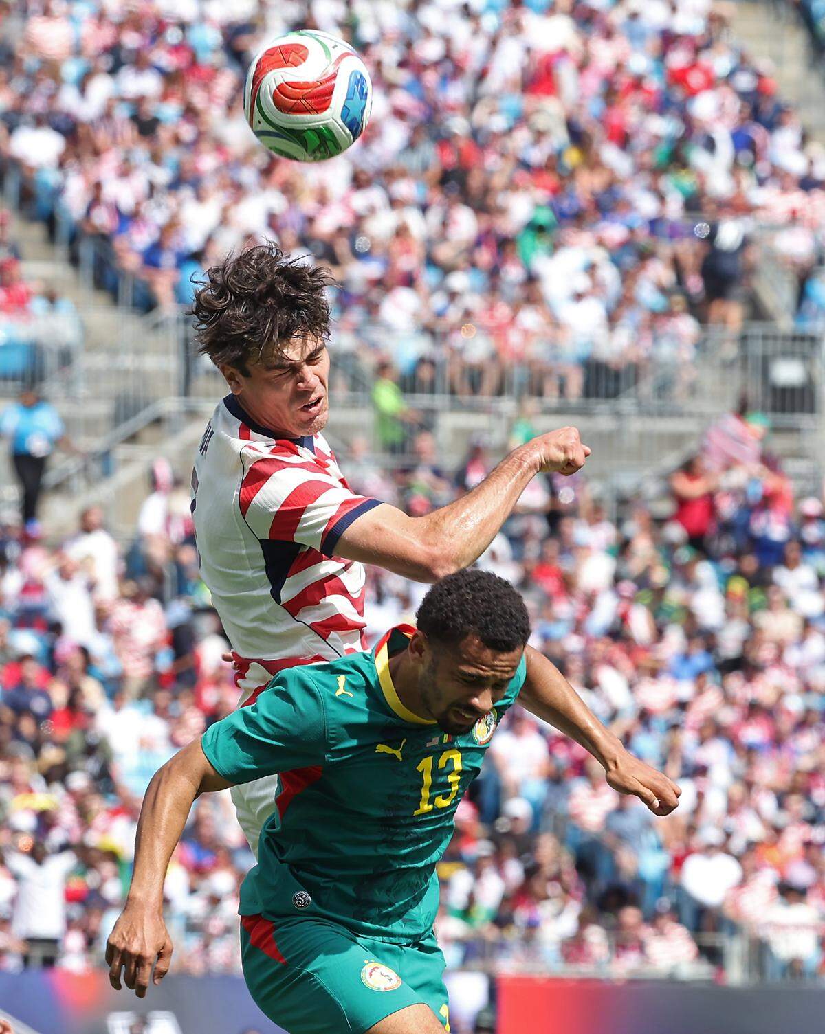 USMNT’S Gio Reyna heads the ball over Senegal’s Ilman Ndiaye during action on Sunday, May 31, 2026 at Bank of America Stadium in Charlotte, NC. USMNT defeated Senegal 3-2.