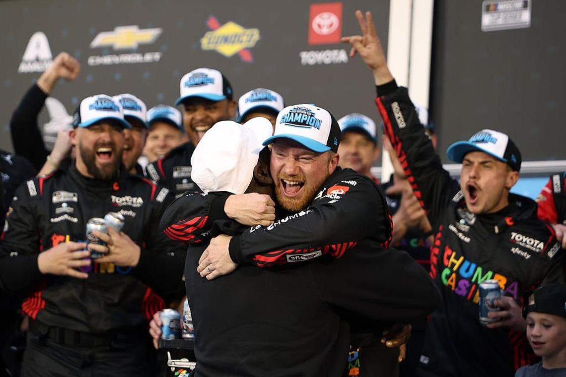 DAYTONA BEACH, FLORIDA - FEBRUARY 15: Tyler Reddick, driver of the #45 Chumba Casino Toyota, and Michael Jordan, NBA Hall of Famer and co-owner of 23XI Racing celebrate in victory lane after winning the NASCAR Cup Series Daytona 500 at Daytona International Speedway on February 15, 2026 in Daytona Beach, Florida. (Photo by James Gilbert/Getty Images)