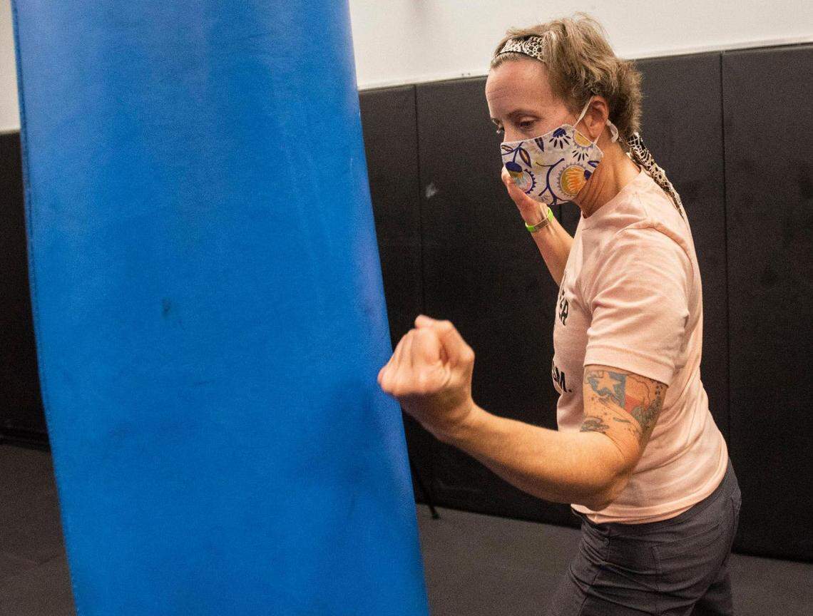 American Airlines crew member, Courtney McDonald, works on punching techniques during a self defense training class at the Federal Air Marshal Service Charlotte Field Office.