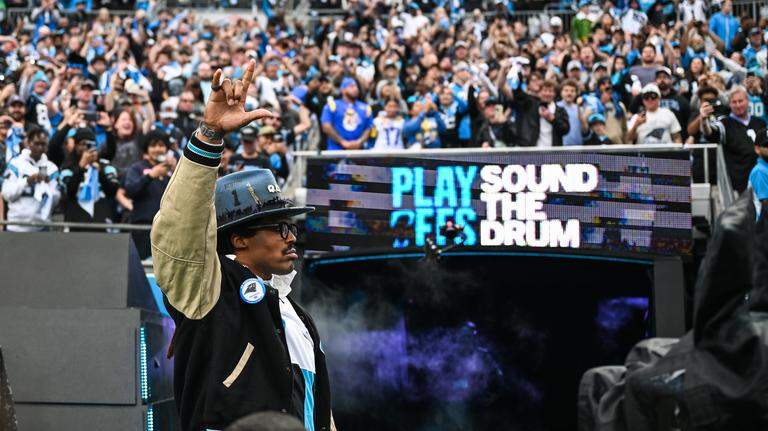 PHOTOS: Cam Newton returns to Charlotte for Panthers-Rams game