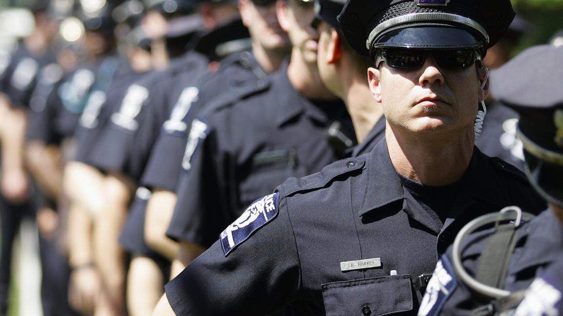 Charlotte-Mecklenburg police officers helped contain protesters marching before the 2012 Democratic National Convention. The Republican National Convention’s host committee would pay the city for costs of a 2020 event that are not covered by an expected $50 million federal grant, according to a summary of two contracts.