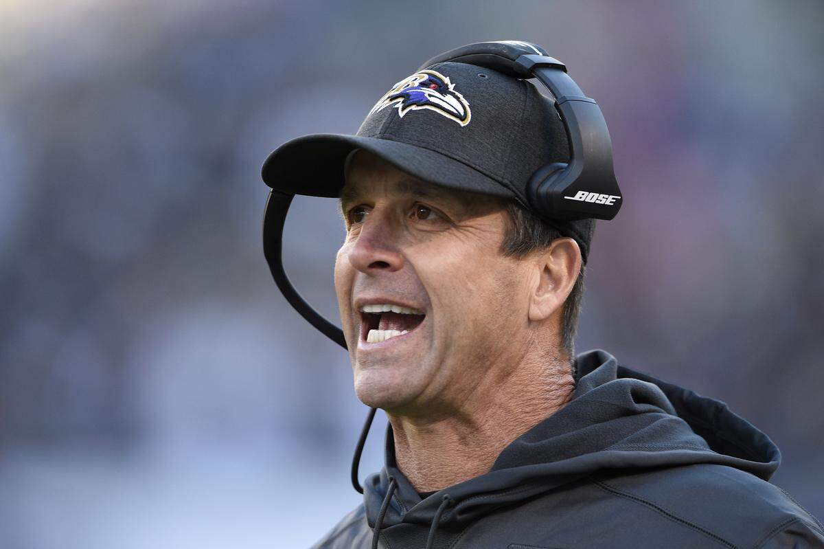 Current Baltimore Ravens head coach John Harbaugh often visited his brother Jim when the latter was teammates with Ron Rivera with the Chicago Bears. (AP Photo/Nick Wass)