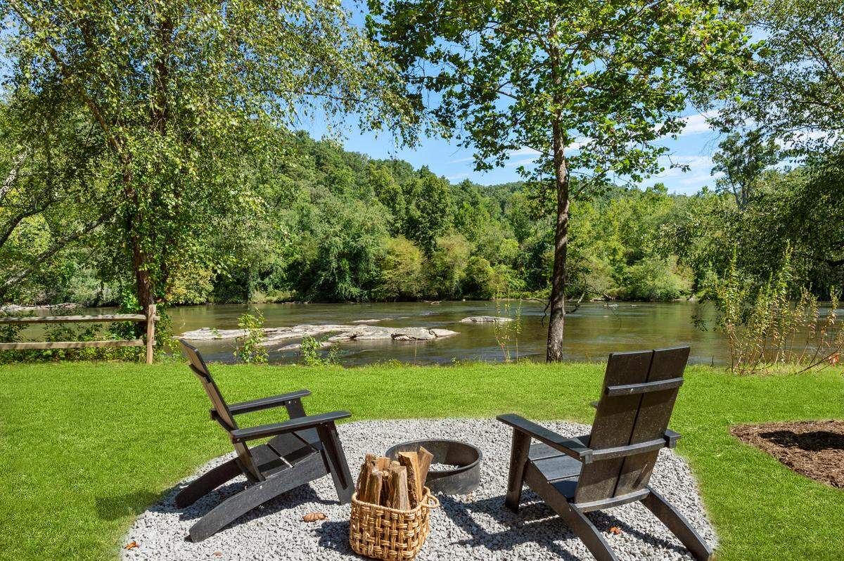 Asheville River Cabins is located next to the French Broad River in Arden, NC.
