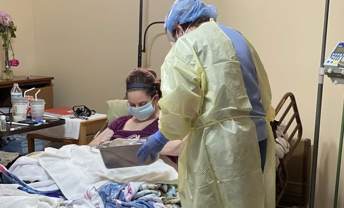 A home health agency sent someone to help at night, until one of the nurses came with a cough. Afterward, caregiver Mel Umbarger tested positive for COVID-19, and Colleen Davis developed symptoms.
