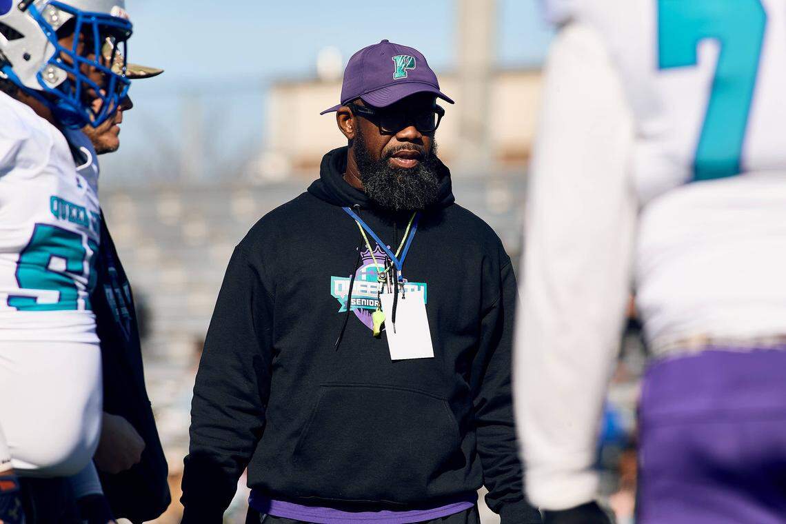 Palisades High School and West Team Head Coach Jonathan Simmons gets his team ready prior to the start of the Queen City Senior Bowl hosted at Olympic High School.