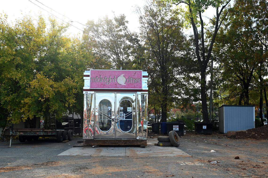 The front entrance to the Midnight Diner sits Wednesday in a parking lot near the businesses former location at East Carson Boulevard. The rest of the boxcar was moved to uptown Charlotte.