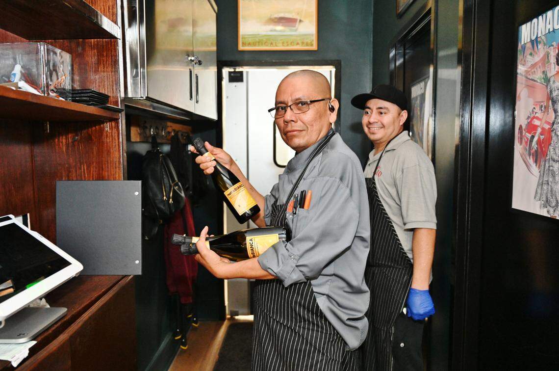 Staff prep for service at Aqua e Vino.