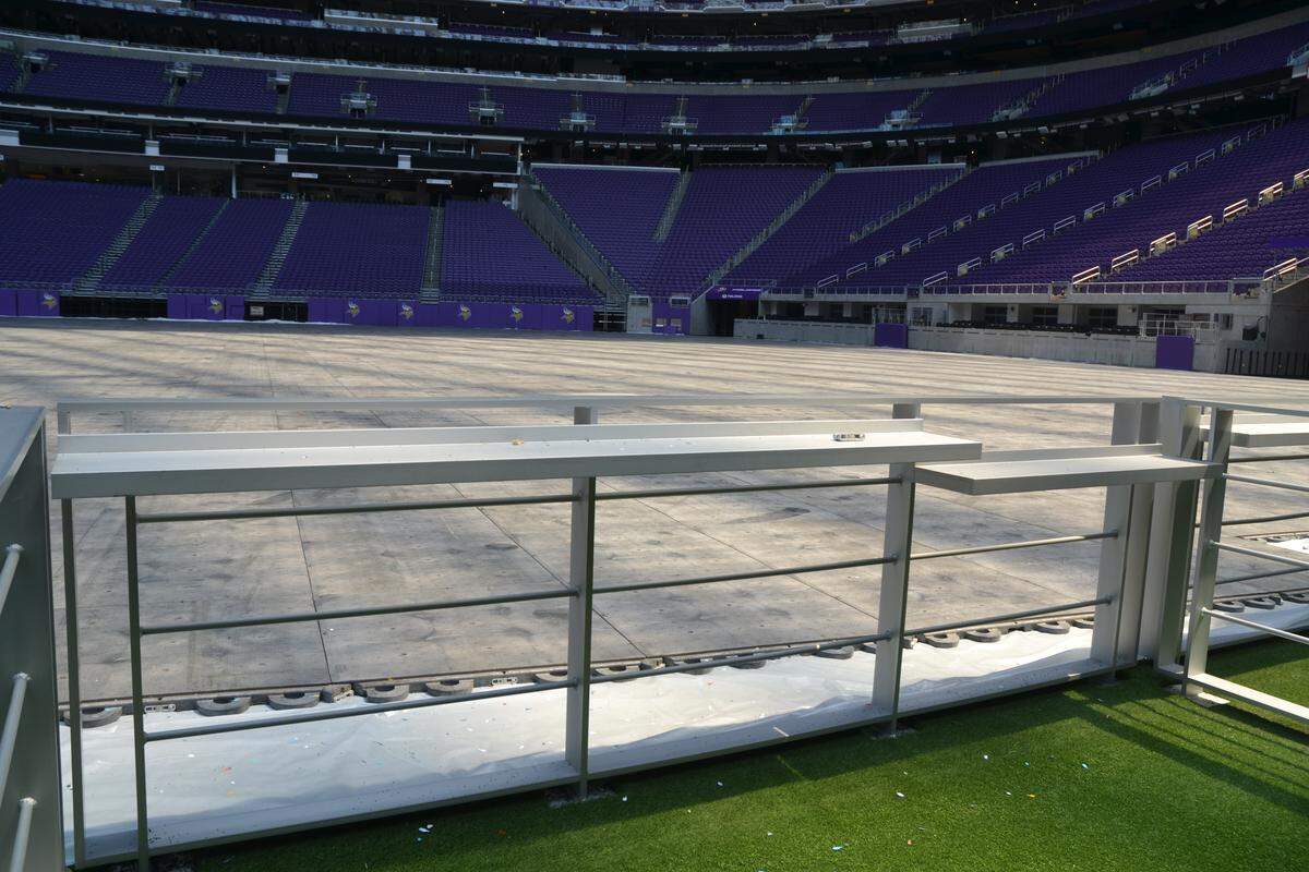 U.S. Bank Stadium has field-level suites that allow fans to be on the artificial turf.