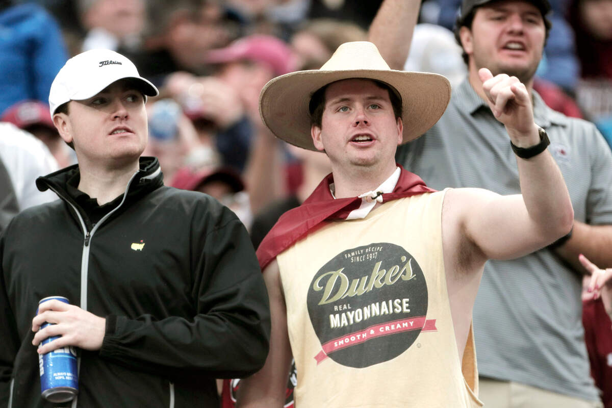 Fans watch during South Carolina’s game against North Carolina at the Duke’s Mayo Bowl at Bank of America Stadium in December 2021.