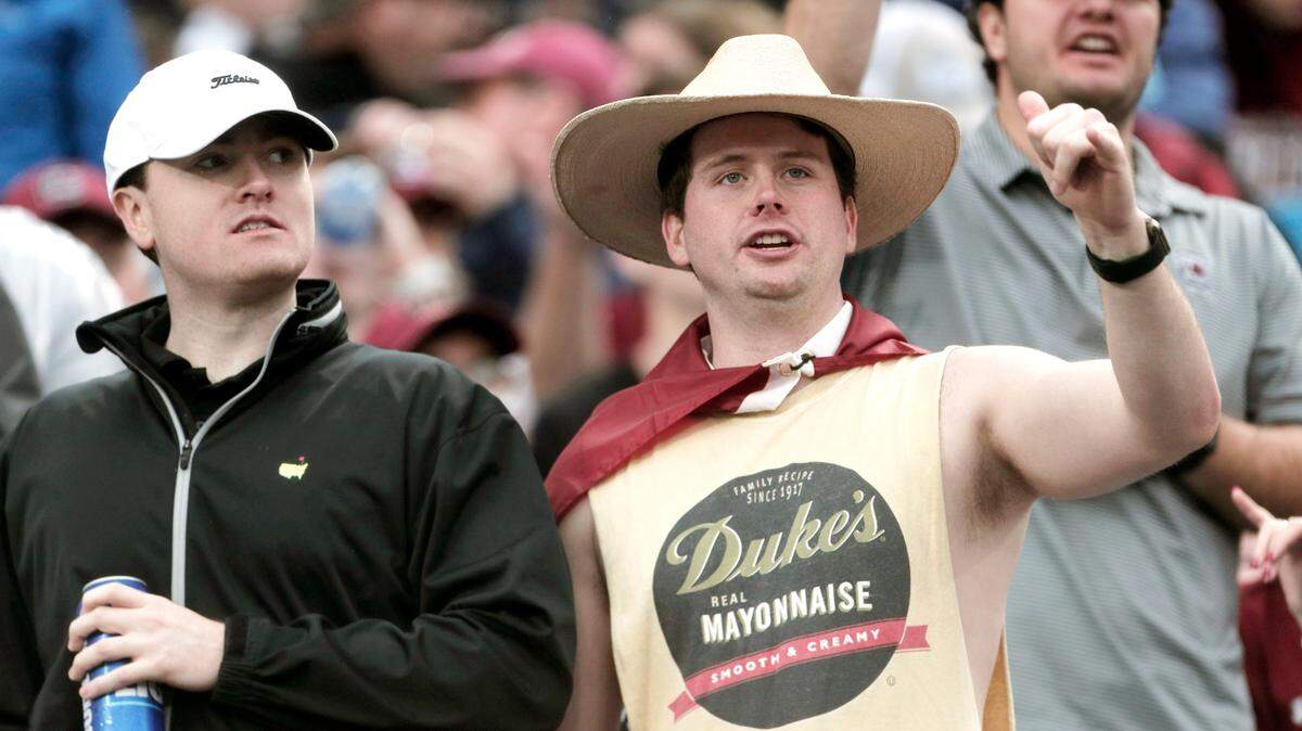 Fans watch during South Carolina’s game against North Carolina at the Duke’s Mayo Bowl at Bank of America Stadium in December 2021.