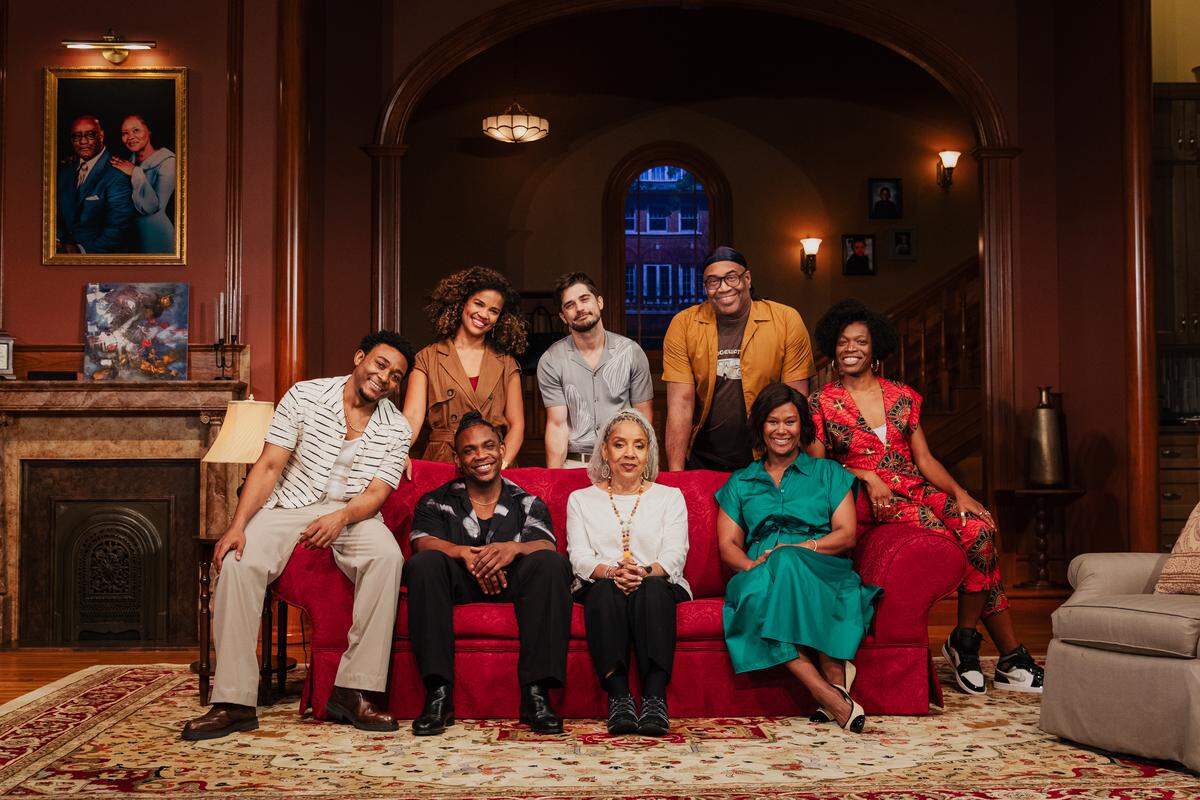 The cast of “Immediate Family” with director Phylicia Rashad, center, seated, and playwright Paul Oakley Stovall, standing, second from right.