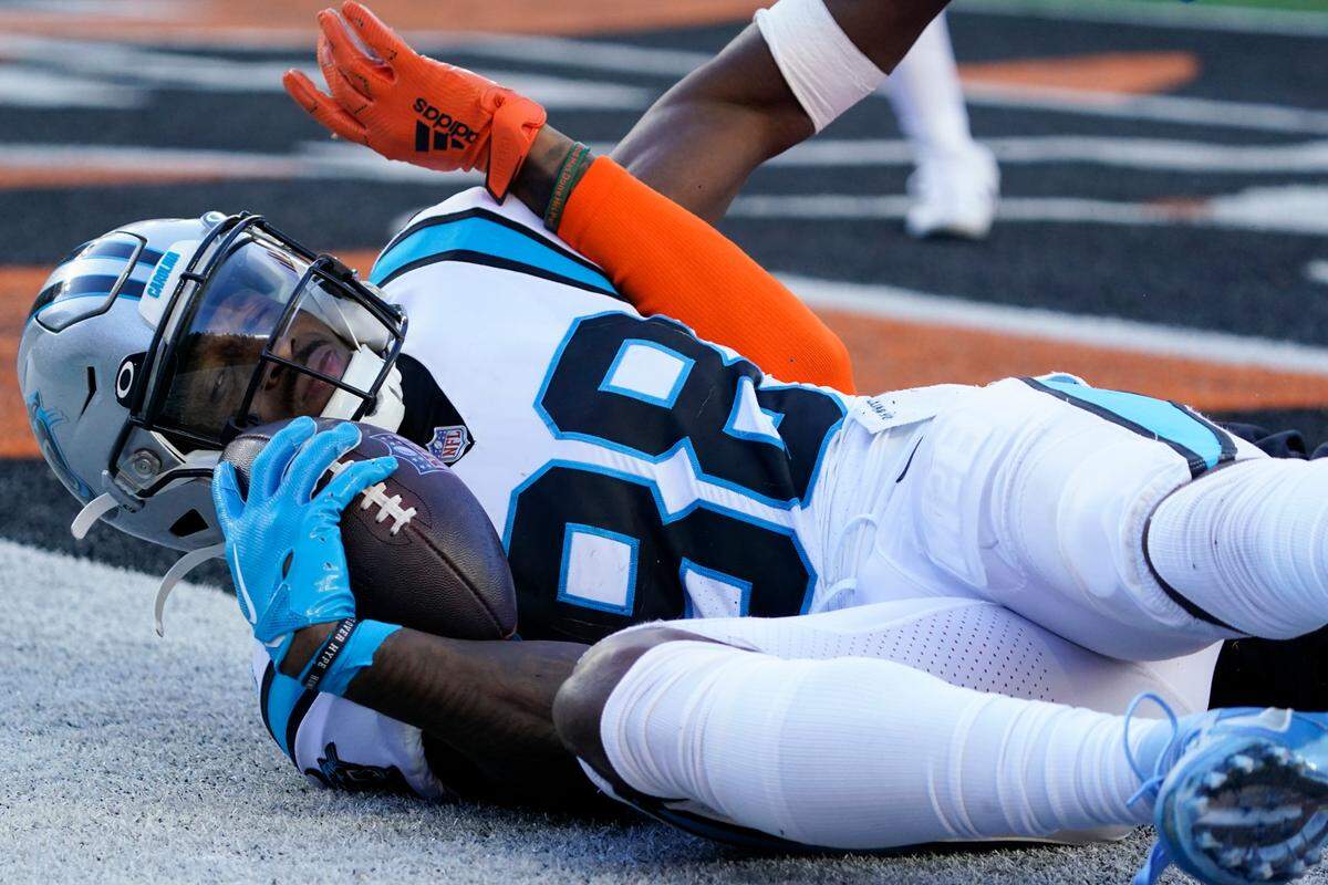 Carolina Panthers wide receiver Terrace Marshall Jr. (88) rolls through the end zone after making a touchdown catch against the Cincinnati Bengals during the second half of an NFL football game, Sunday, Nov. 6, 2022, in Cincinnati. (AP Photo/Joshua A. Bickel)