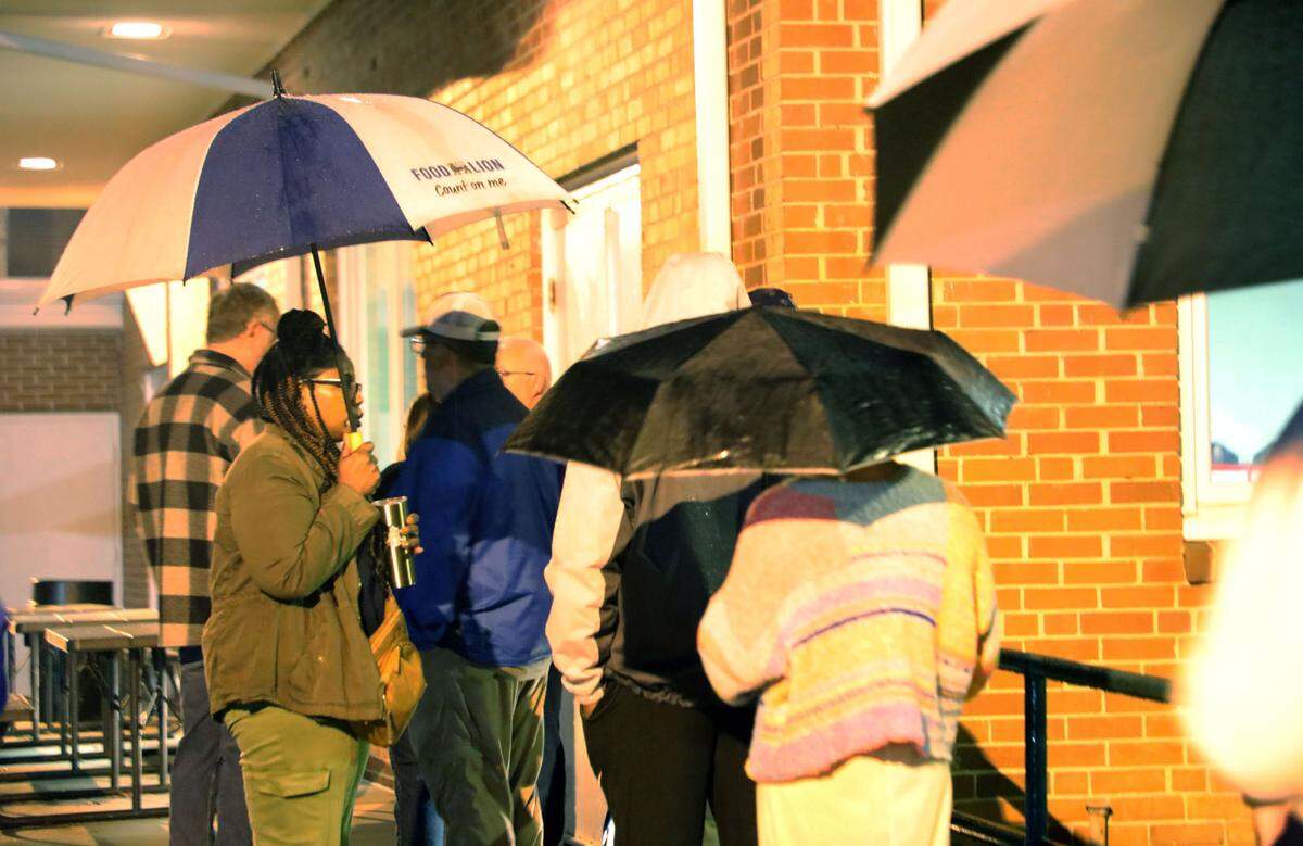 Voters line up as early as 4 AM to cast their ballot at the War Memorial Building, 220 N. Maple Street, Mooresville N.C. on Tuesday, November 5, 2024.