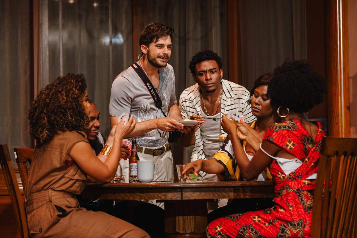 The cast of “Immediate Family” and their game of cards called Bid Whist.