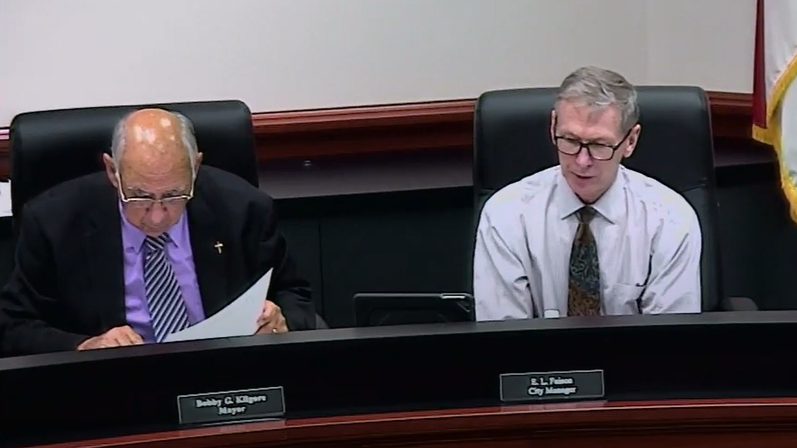 In this screen capture from the City of Monroe’s YouTube channel, now-former City Manager Edward “Larry” Faison, middle, sits in between Monroe Mayor Bobby Kilgore and City Council member Surlata Anthony, right, during a recent council meeting. The council voted 4-3 to terminate Faison’s contract on Friday, July 30, 2021.
