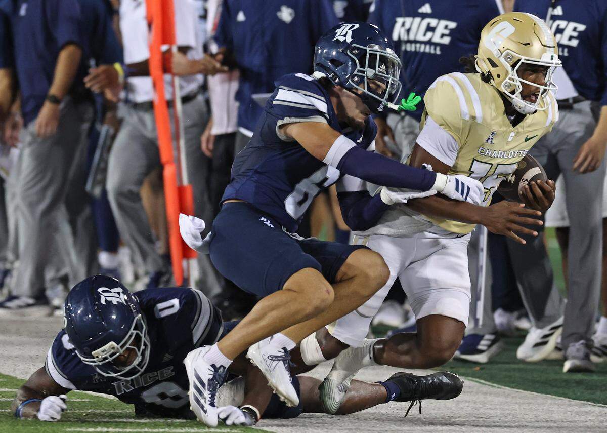 Charlotte 49ers quarterback Conner Harrell is forced out of bounds on a run against the Rice Owls during action on Thursday, September 18, 2025 at Jerry Richardson Stadium in Charlotte, NC. Harrell was injured on the play.
