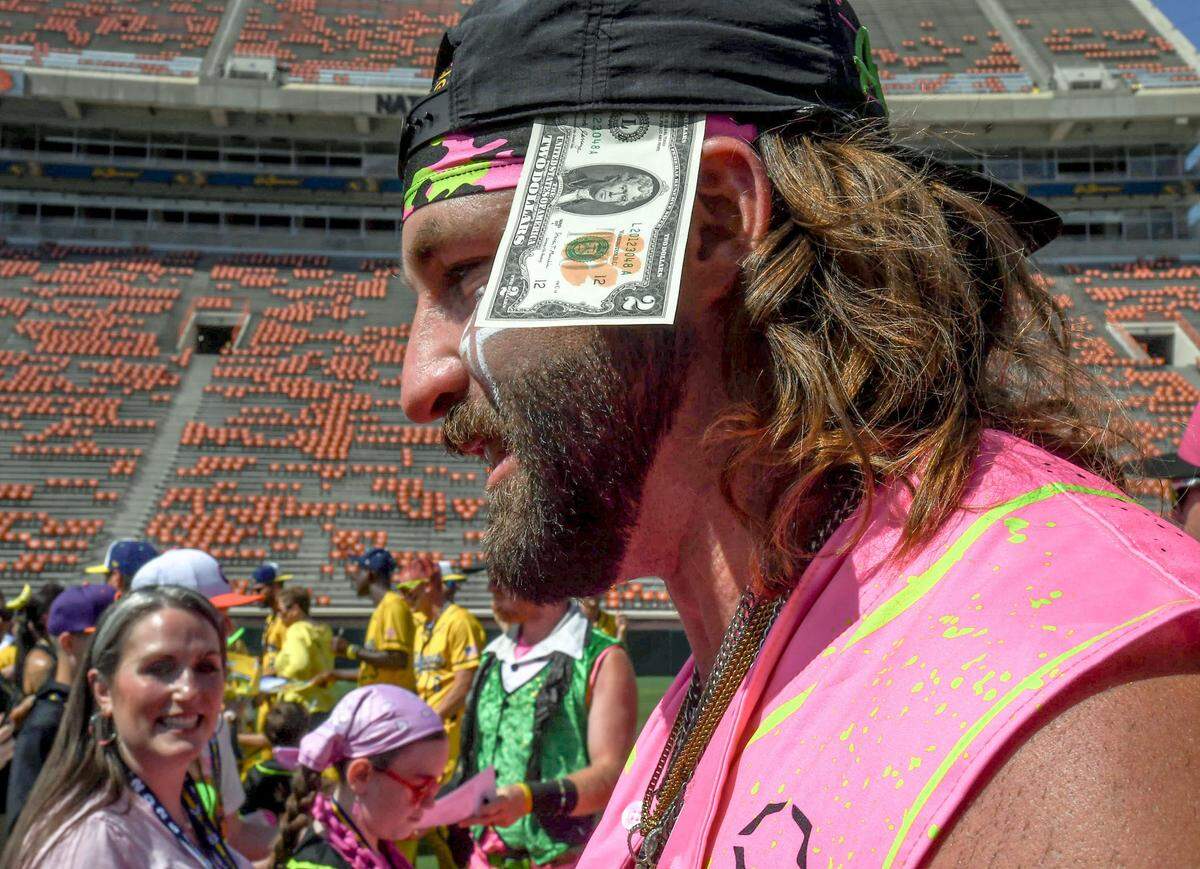 Party Animals outfielder Reece Hampton (6) has a Tiger two-dollar bill tucked in his cap, before the game with the Savannah Bananas and Party Animals at Memorial Stadium in Clemson, S.C. Saturday, April 26, 2025. The Bananas world tour stop in Clemson with 81,000 is the most fans they have played in front of, in a stadium normally used for Clemson Tigers football games.