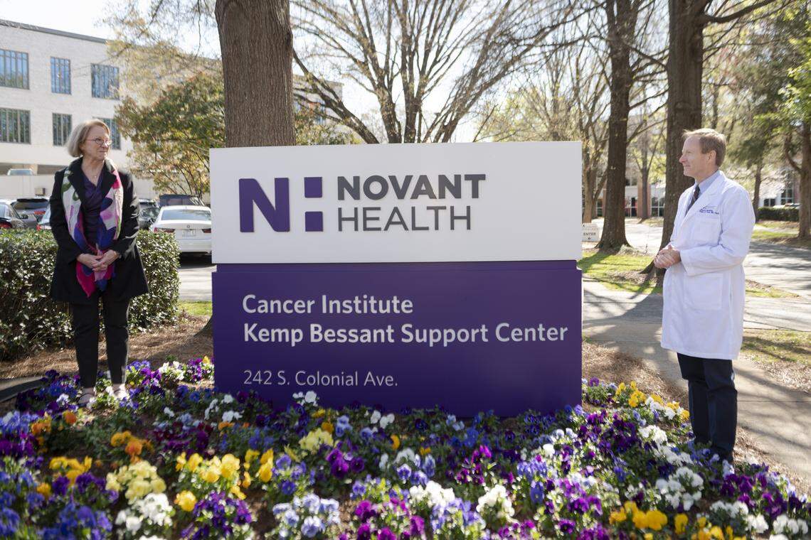 Dr. Peter Turk of Novant Health honors Cathy Bessant during a March 2024 ceremony for a center renamed in her honor. Bessant recently retired as Foundation for the Carolina’s CEO.