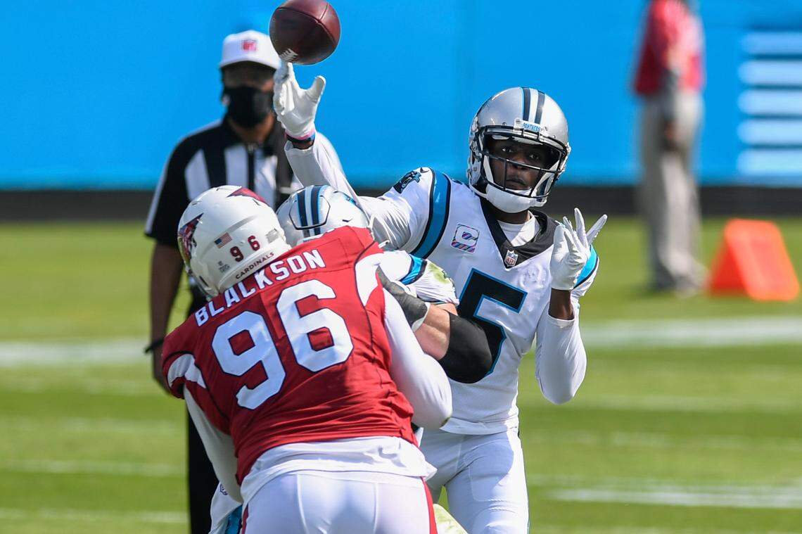 Carolina Panthers quarterback Teddy Bridgewater (5) throws a pass against Arizona Sunday. Bridgewater accounted for three touchdowns in Carolina’s 31-21 win.