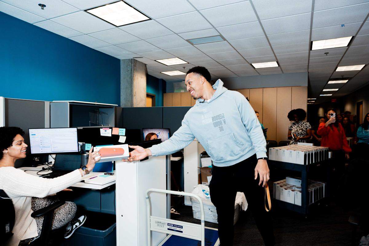 Charlotte Hornets big man Grant Williams hands out gifts to employees in his annual tradition.