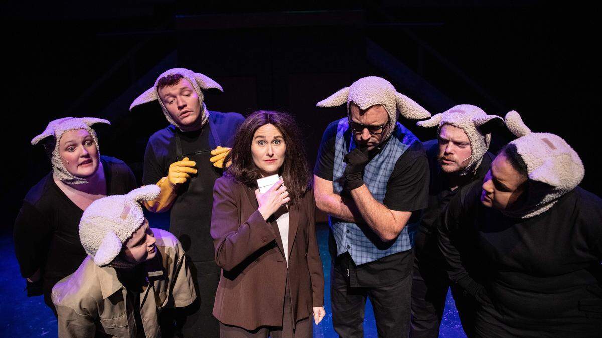 Leslie Giles, center, as Clarice Starling, surrounded by other cast members of Actor’s Theatre of Charlotte’s “Silence! The Musical.”