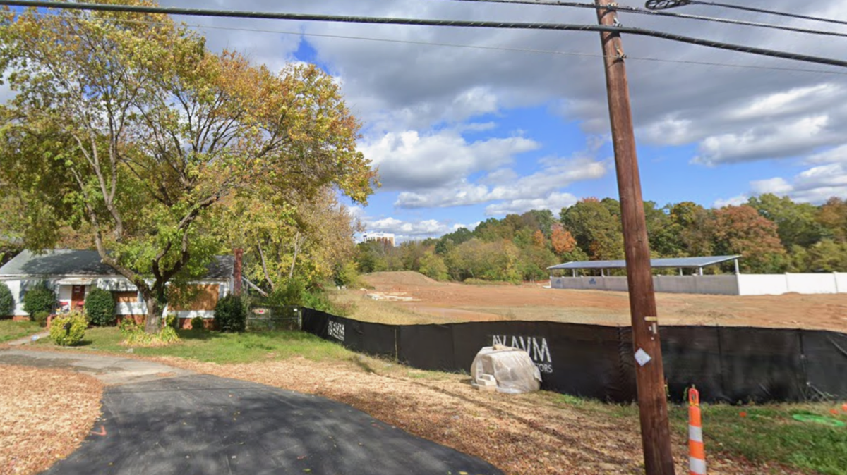 The house at 5701 Monroe Road sits beside county-owned land slated for Park and Recreation use. A Charlotte man is asking a judge to pause its demolition while he seeks guardianship over his grandmother, who has dementia.