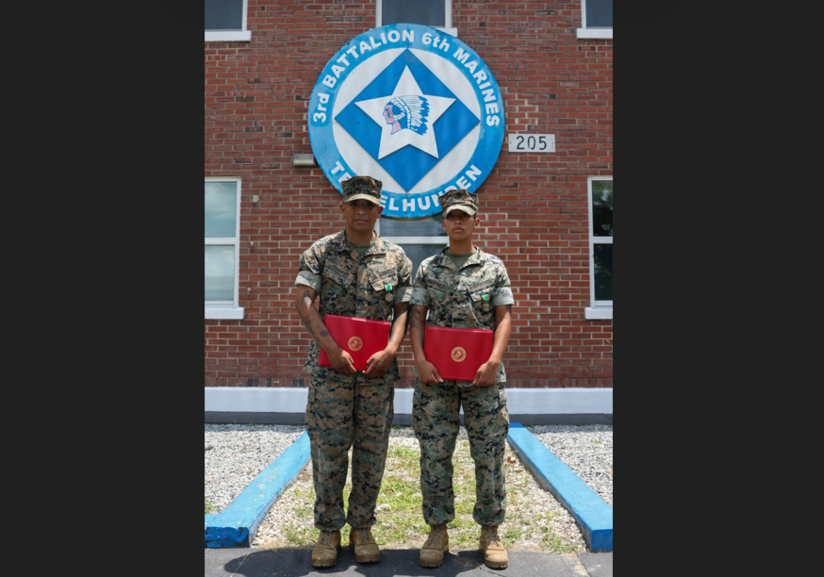 Cpl. Johnny Tamayo, left, a ground electronics transmission systems maintainer, and Cpl. Emily Martinez, a transmissions system operator, both with 3rd Battalion, 6th Marine Regiment, 2nd Marine Division, have been honored for rendering aid after a nightclub shooting in Wilmington, NC.