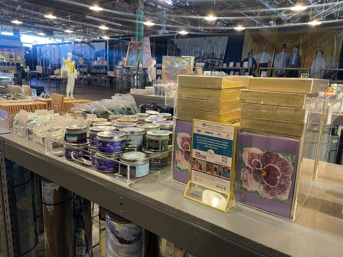 At the Immersive Van Gogh exhibit, Holy Angels residents are selling artwork, candles and other goods that they’ve created.