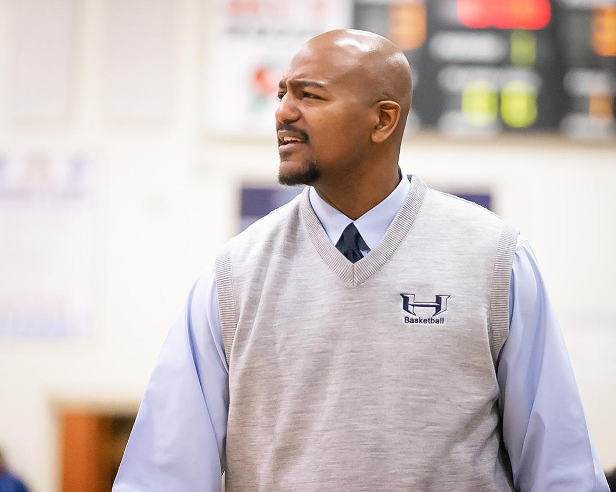 Hopewell Titan’s Head Coach Michael McNeil looks on as his team would lead 42-33 at the half.