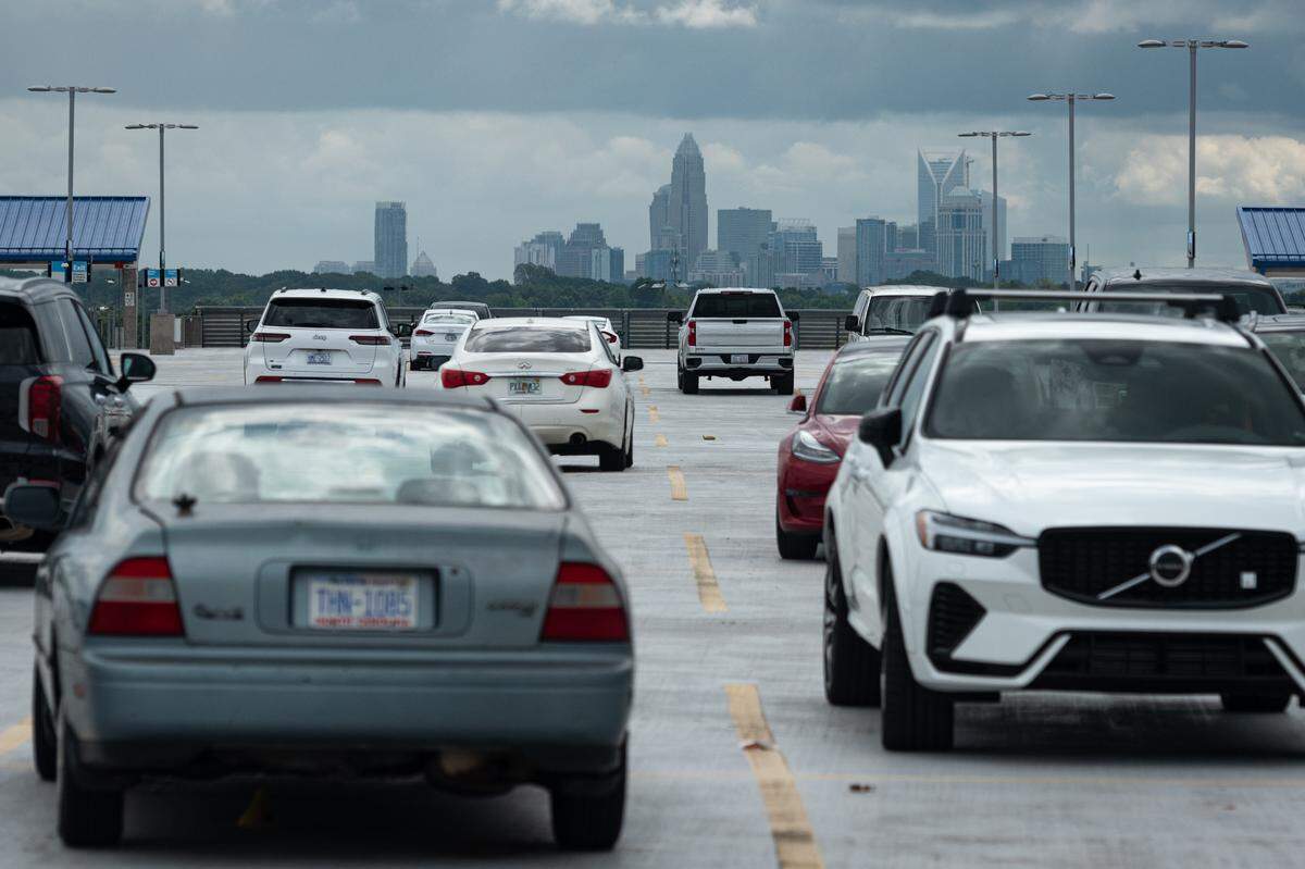 The uptown Charlotte skyline is shown from the seventh-floor roof of the hourly parking deck at Charlotte Douglas International Airport. Parking fees increased on Nov. 6.