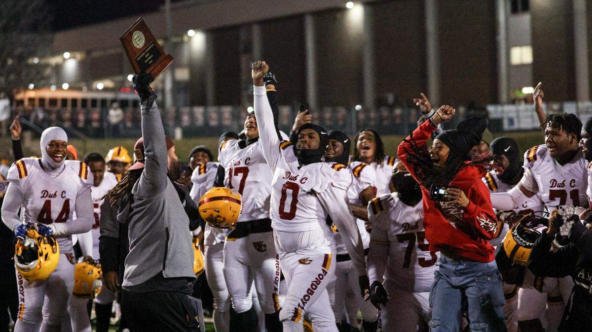 West Charlotte celebrates defeating Hickory, 36-20, during the NCHSAA 3A regional championship at Hickory High School on Friday, December 13, 2024.