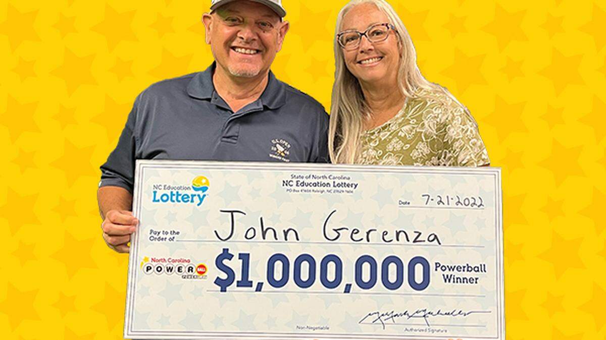 John Gerenza and his wife, Caroline, pose at N.C. lottery headquarters in Raleigh on Thursday, July 21, 2022, after his $1 million Powerball win.