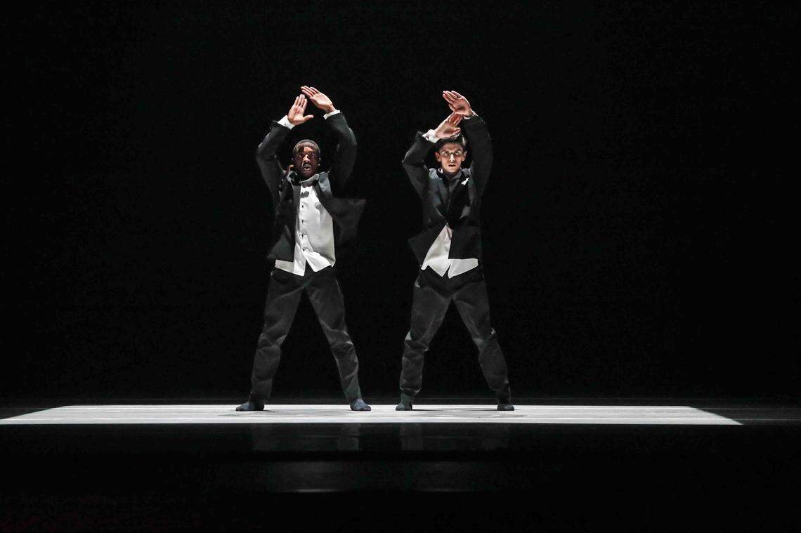 Charlotte Ballet dancers Maurice Mouzon, Jr., left, and Peter Mazurowski, right, perform in French choreographer Medhi Walerski’s “Petite Ceremonie.”