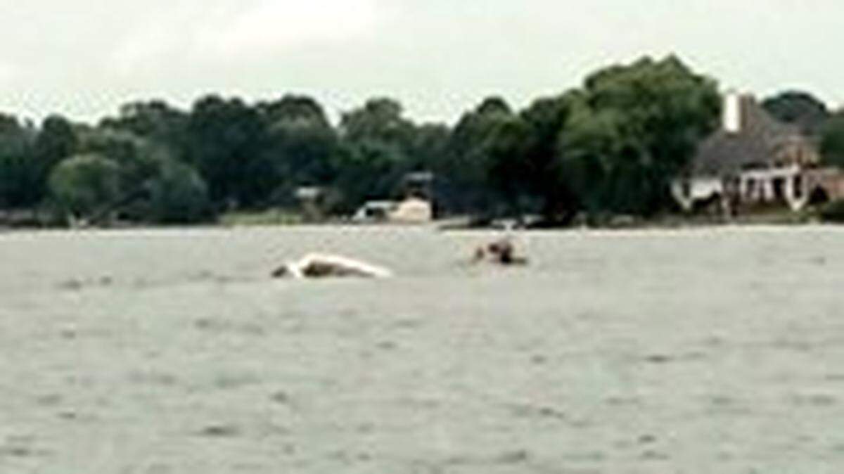 Emergency crews rescued 26 boaters who were learning to sail on Lake Norman when a storm tossed them