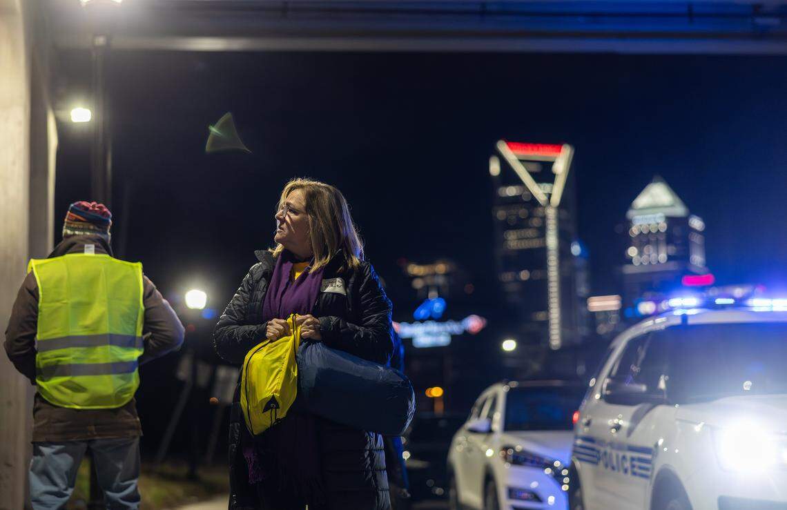 County Commissioner Laura Meier carries supplies to give to an unhoused person during the 2026 Point-in-Time Count in Charlotte, N.C., on Thursday, January 22, 2026.