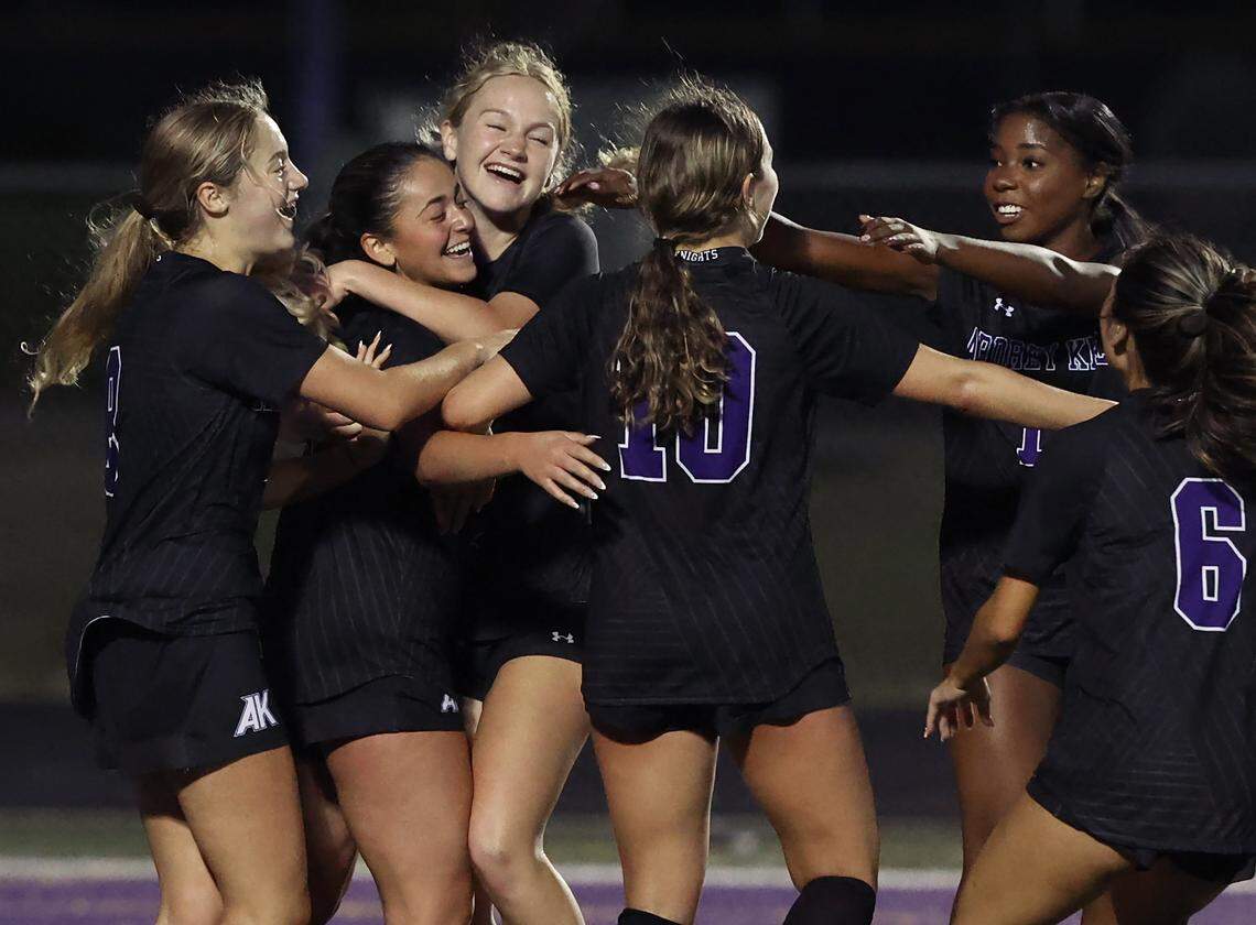 Ardrey Kell's Mina Agajan, second from left, is congratulated by her teammates following her goal during action against Ballantyne Ridge in girls soccer action at Ardrey Kell High School on Tuesday, April 28, 2026. Ardrey Kell defeated Ballantyne Ridge 1-0.