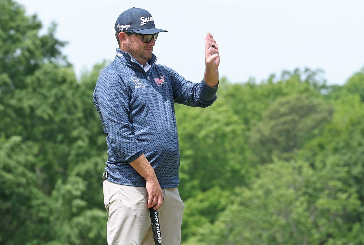 Matthew NeSmith lines up a putt on the fifth green during second round action in the Wells Fargo Championship at Quail Hollow Club in Charlotte, NC on Friday, May 5, 2023. NeSmith finished the round at -4.