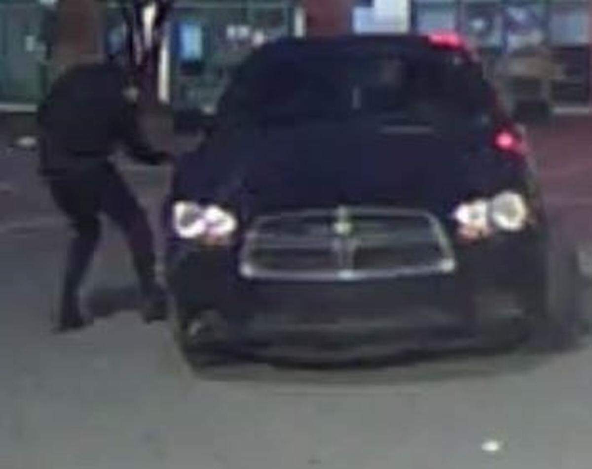 Charlotte-Mecklenburg Police released photos of a suspect and a vehicle in the robbery and shooting death of Karen Baker on July 13, 2022.