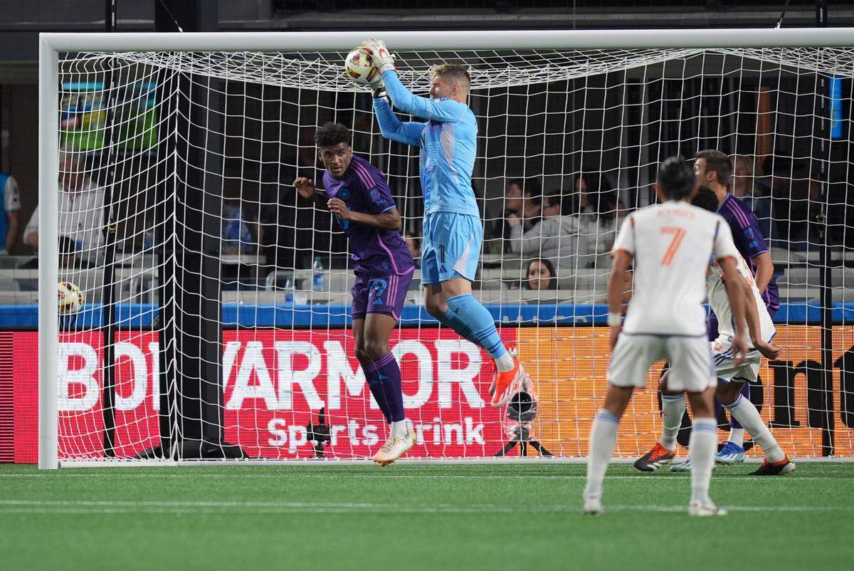Mar 30, 2024; Charlotte, North Carolina, USA; Charlotte FC goalkeeper Kristijan Kahlina (1) makes a save in the second half against FC Cincinnati at Bank of America Stadium. Mandatory Credit: Jim Dedmon-USA TODAY Sports