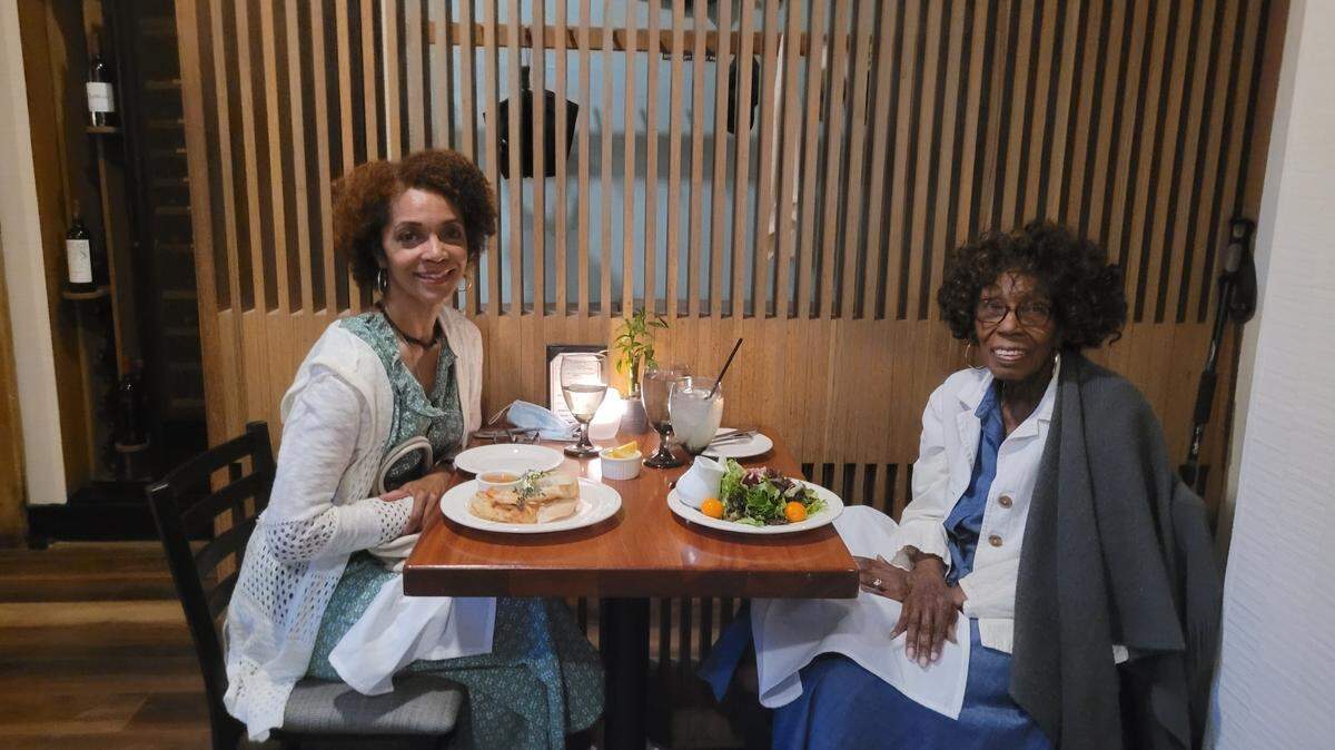 Race, Culture and Community Engagement editor Lisa Vernon Sparks enjoying dinner with her mother, Ethel Vernon at Berret’s Seafood Restaurant and Taphouse Grill, Colonial Williamsburg, Virginia, June 25, 2022.