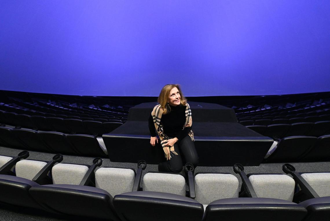 Discovery Place President & CEO Catherine Wilson Horne sits inside the IMAX Dome Theatre on Thursday, January 27, 2022. The theatre has gone undergone renovations and a new name change.