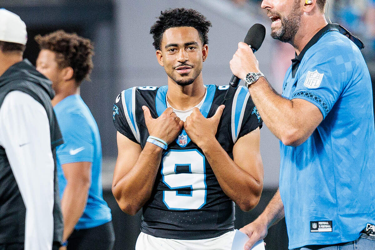 Panthers quarterback Bryce Young looks at the crowd during Fan Fest on Friday, July 31, 2026, in Bank of America Stadium.