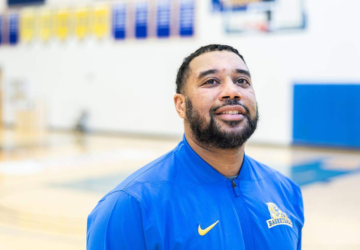 Johnson & Wales basketball coach Marc Slade poses for a portrait at JWU Wildcat Center in Charlotte, N.C., on Wednesday, January 28, 2026.