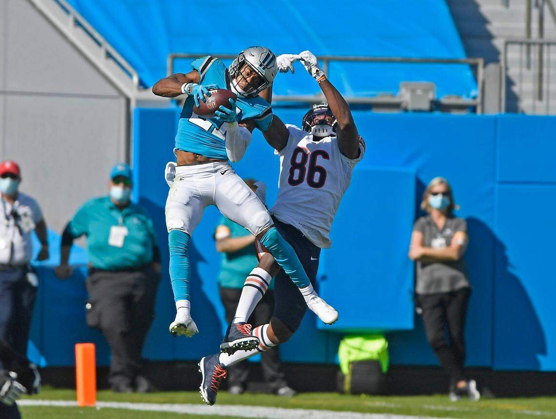 Carolina Panthers outside linebacker Jeremy Chinn (21) intercepts a pass intended for Chicago Bears tight end Demetrius Harris (86) in the fourth quarter at Bank of America Stadium on Sunday, October 18, 2020. The Bears won, 23-16.